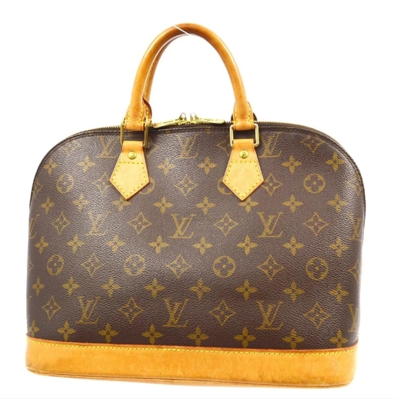 LOUIS VUITTON Alma Monogram Handbag - Picture 2 of 9